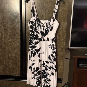 Mid thigh, black and white, floral silhouette, slim to flowy